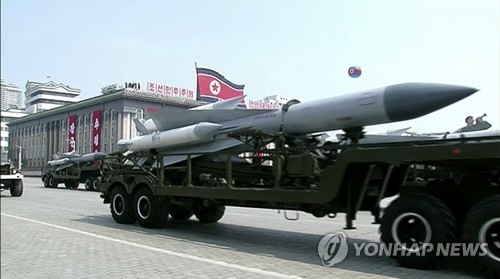북한, 열병식서 신형 ICBM 최초 공개…전략무기 총동원